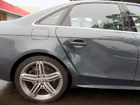 Collision damage on Audi S4 before repairs at Almost Everything Auto Body.