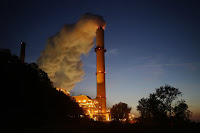 Emissions rising from a coal burning power plant in Chesterton, Ind., last October. (Credit: Luke Sharrett/Bloomberg) Click to Enlarge.