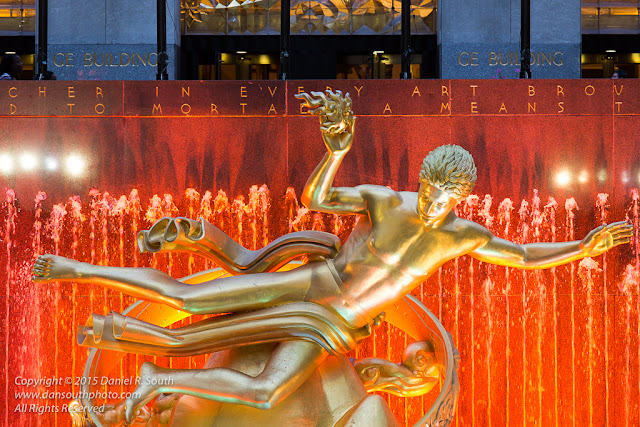 a photo of the statue of prometheus at rockefeller center by daniel south