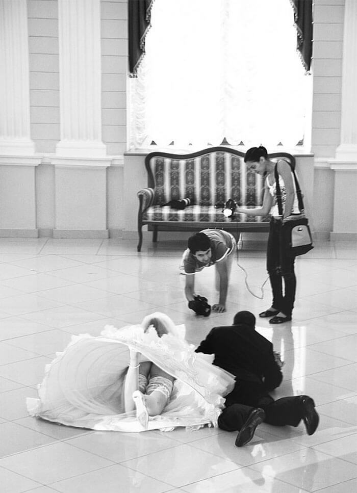 Incredible Wedding Pictures That Show Photographer Will Do Anything To Capture The Perfect Shot