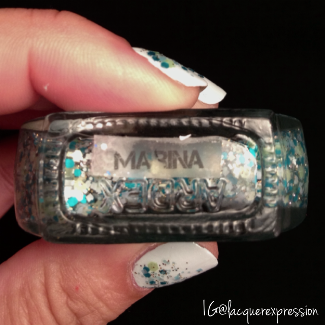 Reverse gradient using Marina glitter nail polish by Paint Nail Studio