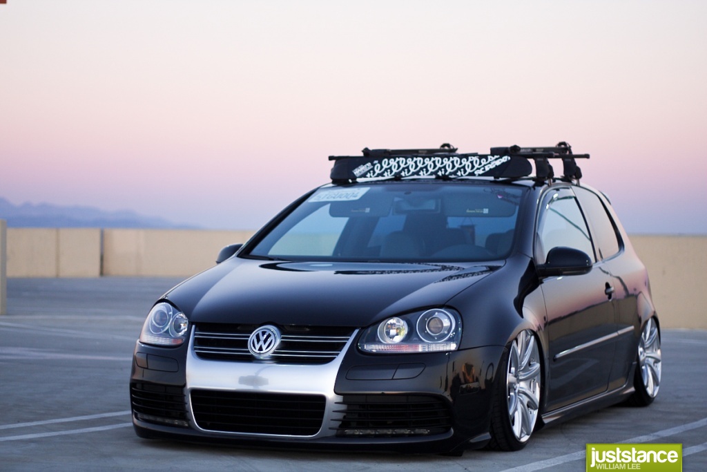 He we find a mkV Golf sitting very very low over 19 Bentley wheels