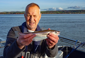 Photo of Phil with one of the larger whiting he caught on this trip