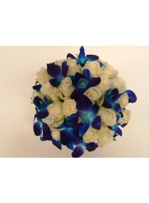 white and yellow rose bouquets. Blue orchids and whit roses