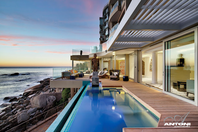 Picture of the ocean as seen from the terrace with swimming pool