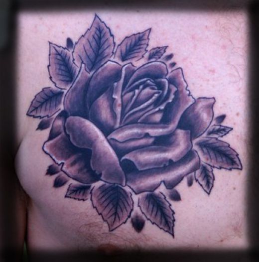 I actually didn't think many guys wud get a black rose tattoo but jeeez this