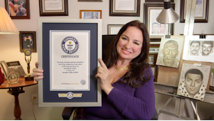 <img src="Lois was recognized.png" alt="Guinness World Record Book">