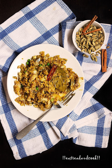 simple and easy bengali recipe and preparation bengali Chire Diye Muri Ghonto recipe / Bengali Sticky Fish Pulao with Flattened Rice recipe with step by step pictures