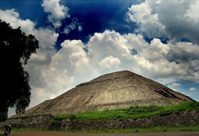 Pyramid of the Sun, It was massive, one of the first great cities of the Western Hemisphere. And its origins are a mystery. It was built by hand more than a thousand years before the swooping arrival of the Nahuatl-speaking Aztec in central Mexico. But it was the Aztec, descending on the abandoned site, no doubt falling awestruck by what they saw, who gave it a name: Teotihuacan. A famed archaeological site located fewer than 30 miles (50 kilometers) from Mexico City, Teotihuacan reached its zenith between 100 B.C. and A.D. 650. It covered 8 square miles (21 square kilometers) and supported a population of a hundred thousand, according to George Cowgill, an archaeologist at Arizona State University and a National Geographic Society grantee.