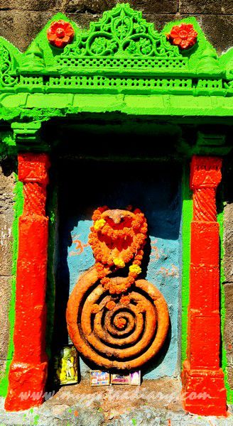 Ornate carvings of KAAL or cobra Naroshankar Temple Nashik