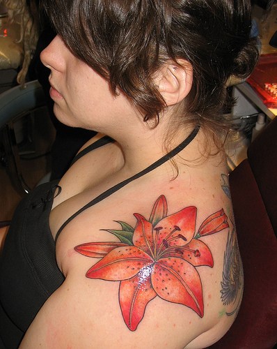 Lily flower tattoo designs look very nice and beautiful For the most part