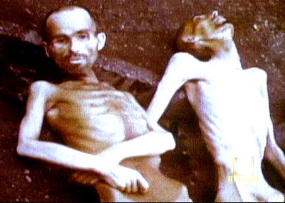 Starving men in Nazi concentration camp during World War 2