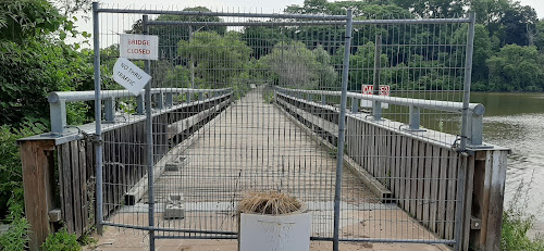 Fence blocking access to Valley Inn Road pedestrian bridge