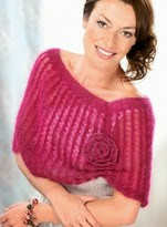 http://www.letsknit.co.uk/free-knitting-patterns/broomstick-crochet-shrug