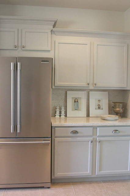 Serene Nordic French style kitchen renovation with pastels and grey cabinets by Hello Lovely studio