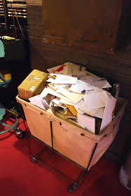 mail room, mail bin, packages, props, set design, B. Altman Department Store