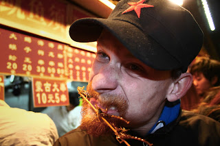 Wangfujing snack street in Beijing and eating scorpions.