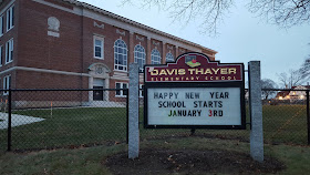 Davis Thayer Elementary School sign "Happy New Year, school starts Jan 3"