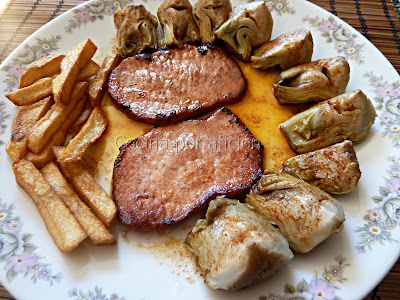 lomo de cerdo con alcachofas confitadas