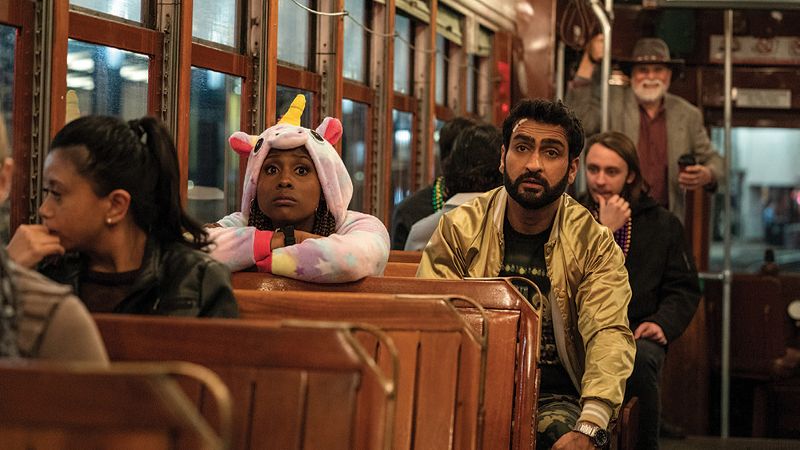 Kumail Nanjiani and Issa Rae in a streetcar