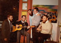 Reb Yosil (guitar, on right) Avraham Fried (the fellow with the beard who's standing and singing) and friends