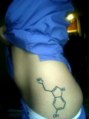 Here is a picture of my serotonin tattoo.