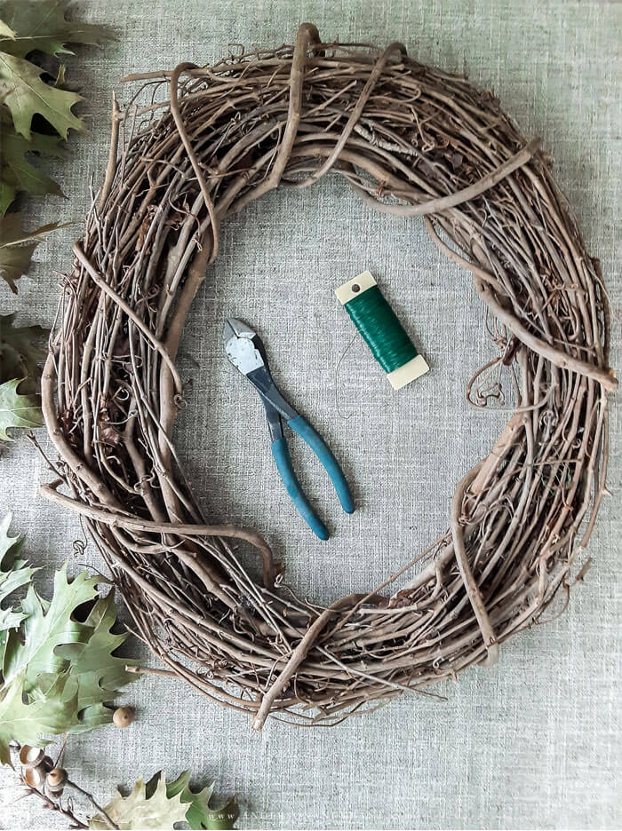 Grapevine wreath, wire, and wire cutters for wreath making