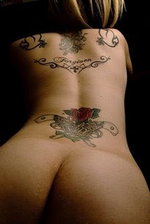 Backside flower tattoo for girl