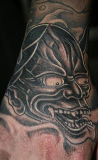 Biomechanical Asian Demon Hand Tatoo