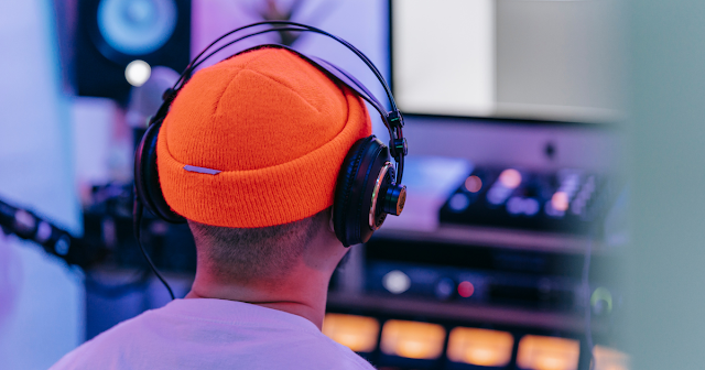 this is  picture of  a man with bluetooth headphones on after he chose the best bluetooth headphones