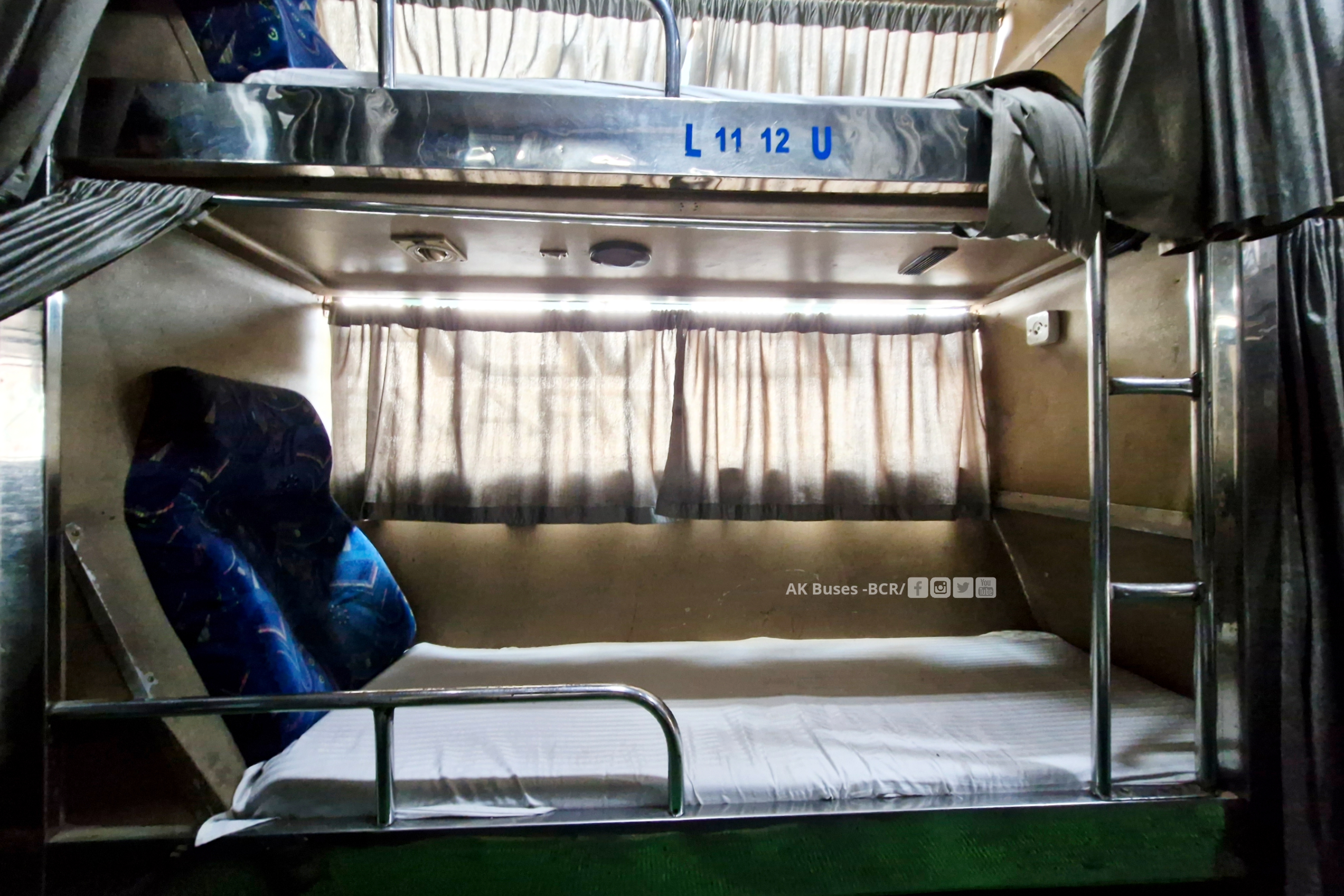 Mahendra heavy green sleeper Bus interior