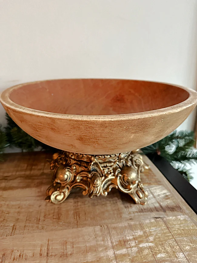 wooden bowl in metal base