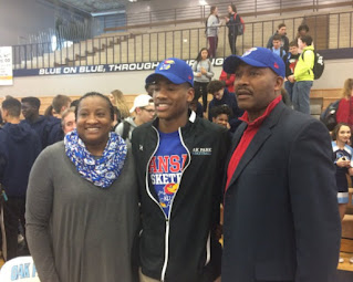 Ochai Agbaji with his parents