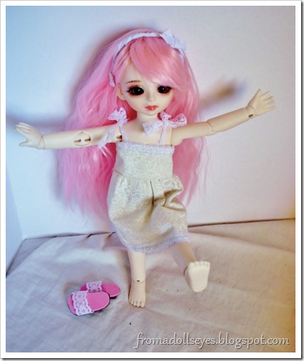 A ball jointed doll enjoying bare feet.