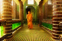 Monk in a temple in Bangkok, Thailand
