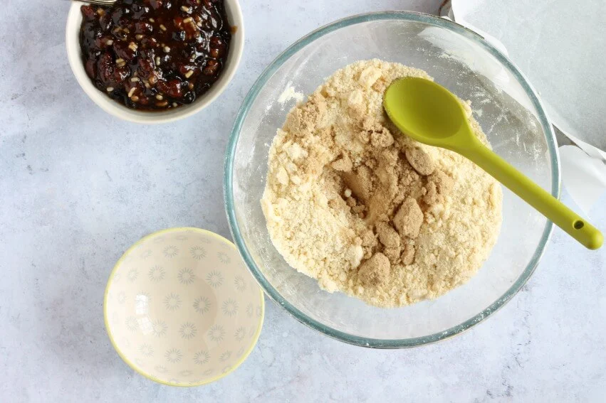 Mix sugar into crumble