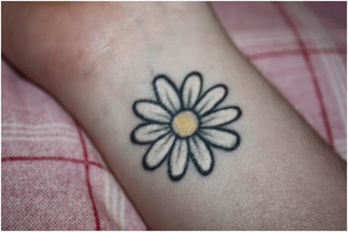 simple daisy tattoo - small tattoo on wrist for girl