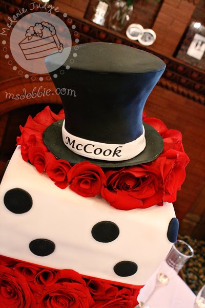 I covered them in fondant made the top hat and put the 50 red roses in 