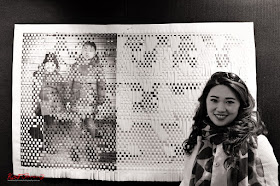 Tami Xiang with artwork at the Head On Hub - Photo by Kent Johnson for Street Fashion Sydney.
