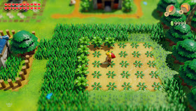 Link cutting grass in Mabe Village. The Rupee counter shows 9999.