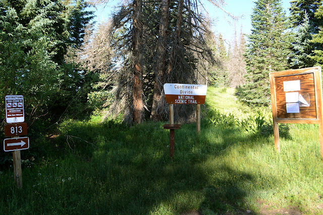 signs, notice board, restrictions, and register at the trailhead along the old highway