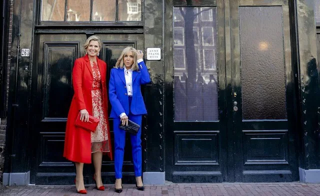 Queen Maxima wore a jaden jacket by Joseph, and red wool coat by Natan. Brigitte Macron wore a blue suit by Louis Vuitton