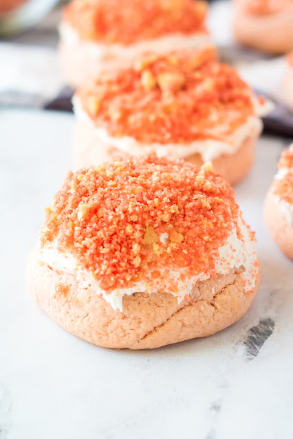 Strawberry Crunch Cookies on a light marble background.