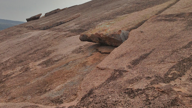 A steep granite face of Enchanted Rock near Fredericksburg, Tx