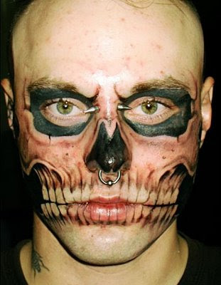 Skull face tattoo.