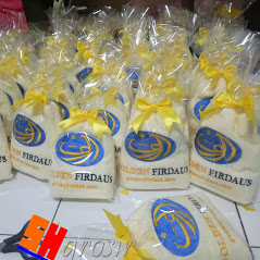 Souvenir promosi handuk bordir pesanan Golden FIrdaus kemasan plastik