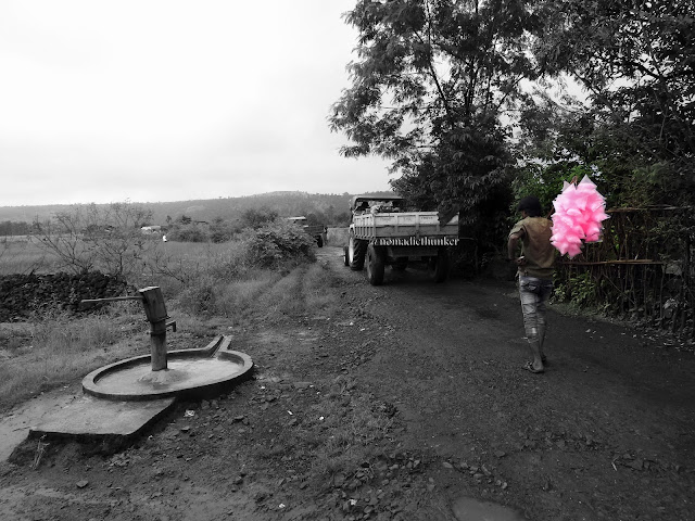 Hand pump. Cotton candy. Village. Dehena. Maharashtra. India 