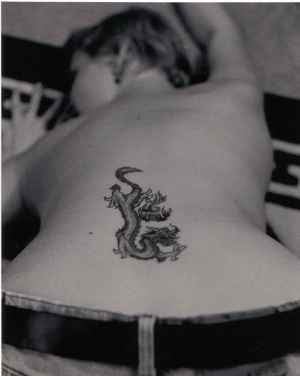 Lower back dragon tattoo
