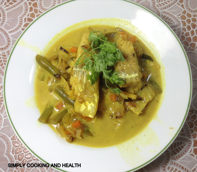   Cod fish soup with  vegetables and spices