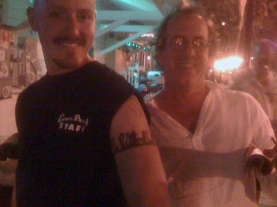 Doorman Justin proudly sports his Tradesman's tattoo for sculptor and